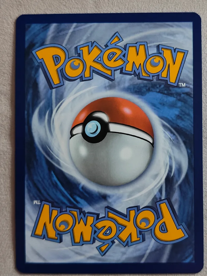 Mew · 30th Celebration · 065 · Holo · Near Mint (back)