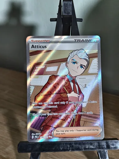 Atticus · Prismatic Evolutions · 134 · Holo · Near Mint