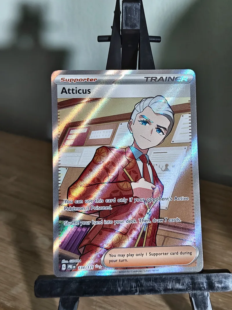 Atticus · Prismatic Evolutions · 134 · Holo · Near Mint